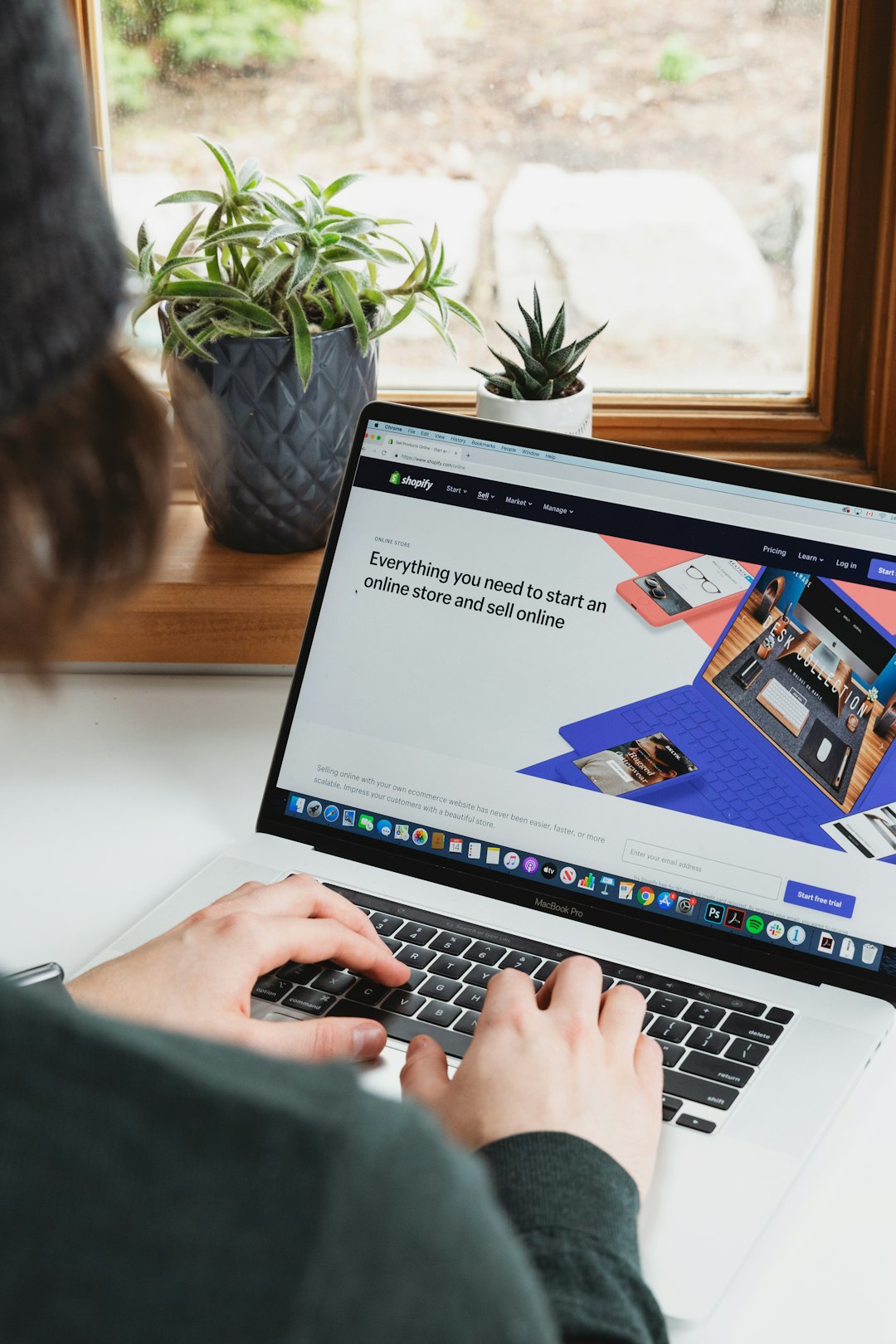 Business owner at a laptop testing a new WordPress AI chatbot before it goes live